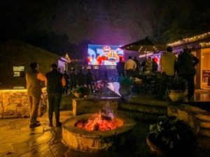 Mobile LED backyard screen for football watch party